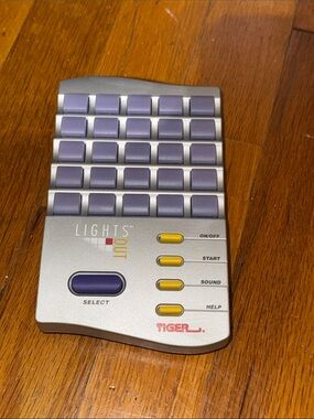 VTG TIGER ELECTRONICS  LIGHTS OUT HANDHELD GAME